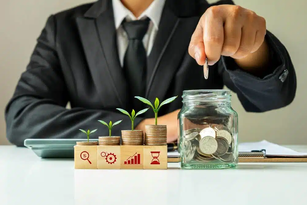 Business consultant showing investment growth and money savings