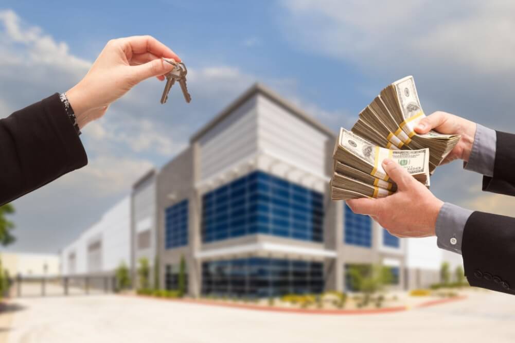 Real estate deal with cash payment and keys exchange