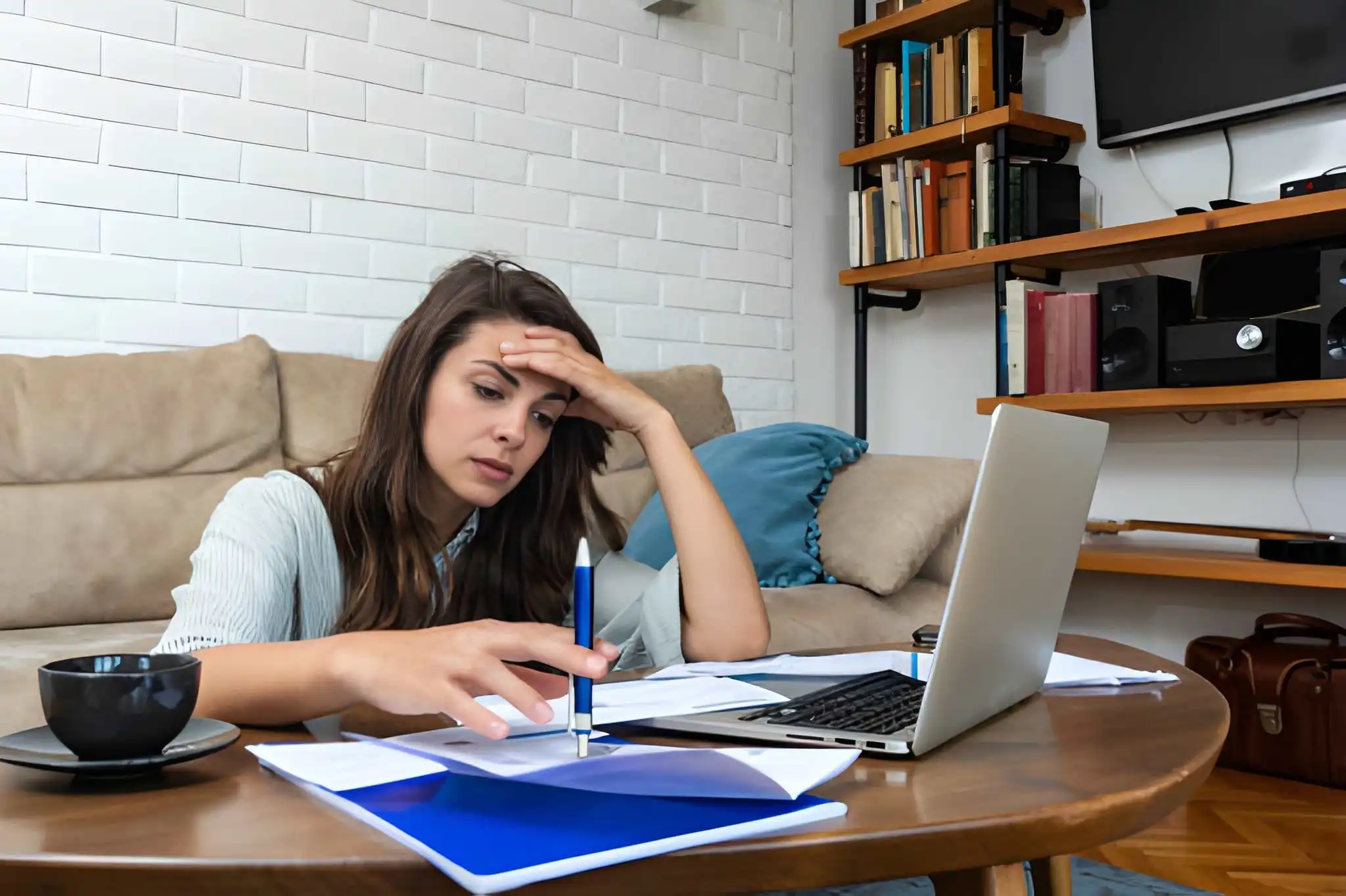 Young stressed woman having issue with term loan